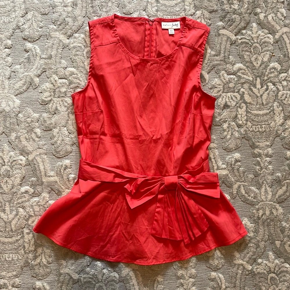 Peplum top with bow